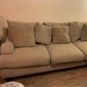 Beige couch pillows included